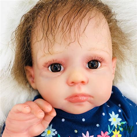 baby dolls that are cheap and there shiny and new